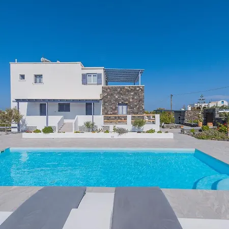 Golden Sunrise In Santorini Kamári